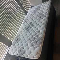 Basically new Serta Mattress Twin XL With Matching Frame