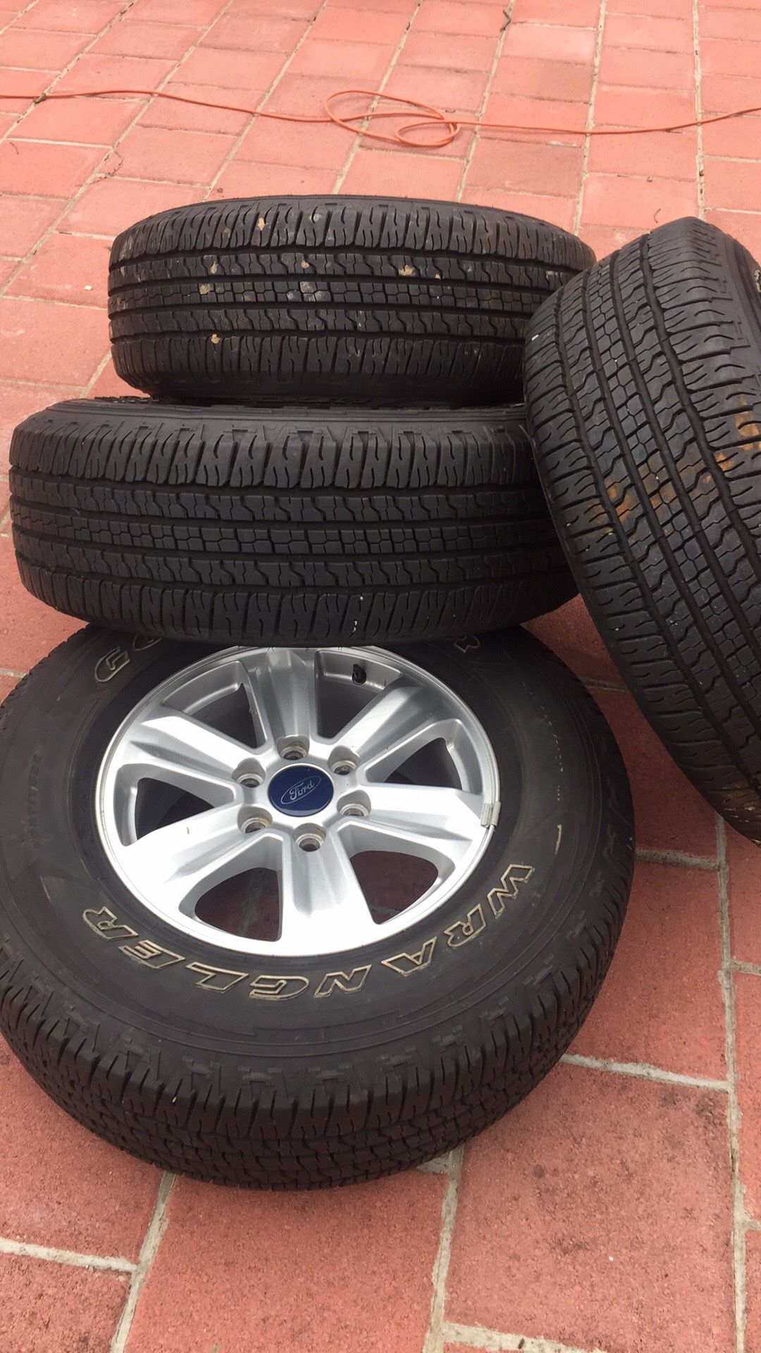 I sale one set of ford f 150 tires and rims very good tires I asking $850 or best ofert