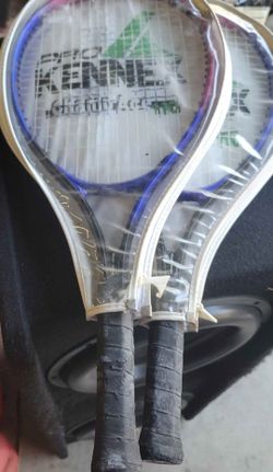 Pair of tennis/racquet ball racquets