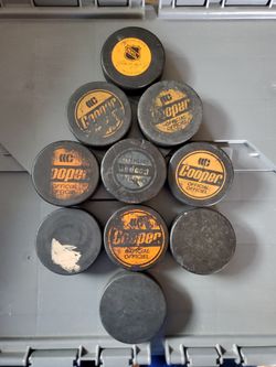 Official Blackhawks hockey pucks 1986plus