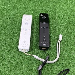 2 Nintendo Wii Remotes