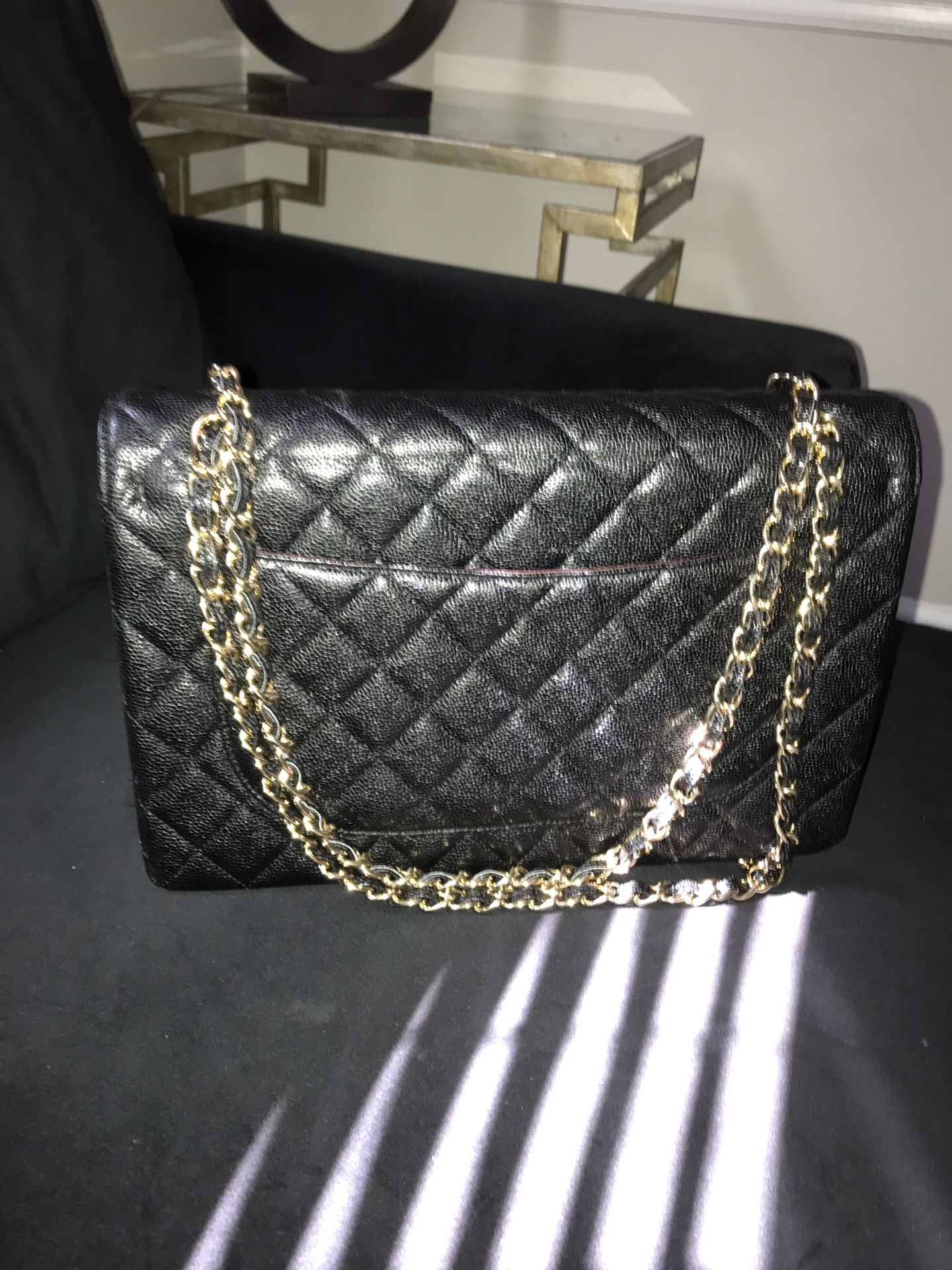 Black Caviar leather flap handbag. With box and duster bag