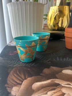 2.5 in pots hand painted by me