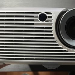 Infocus X1 Projector with cables, remote, manuals and carrying case.