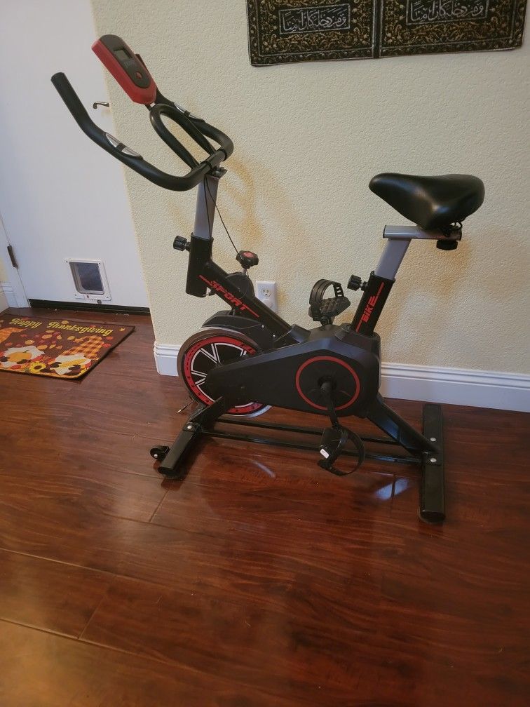 Indoor Spinner Exercise Bike • Adjustable • Smooth & Quiet Ride
