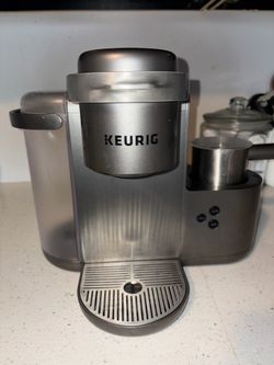 Coffee maker with frother