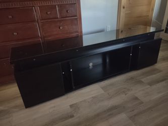 Brand new solid wood Ashley TV stand 71x15x20