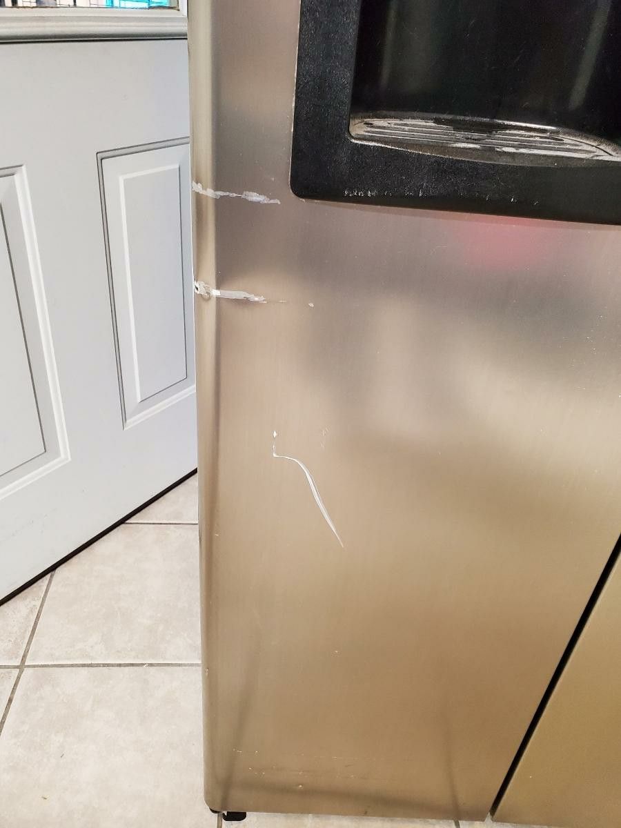 GE 25.0 Cu. Ft. CleanSteel SideBySide Refrigerator with Dispenser