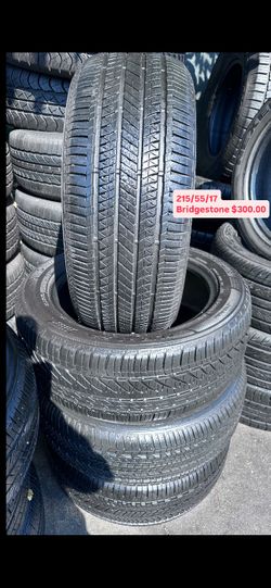 SET OF FOUR USED TIRES ALMOST NEW 215/55/17 BRIDGESTONE 
