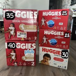 Five unopened box of size two diapers!