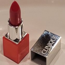 Clinique Pop Glaze Sheer Lip Colour + Primer in the shade "03 Fireball Pop."