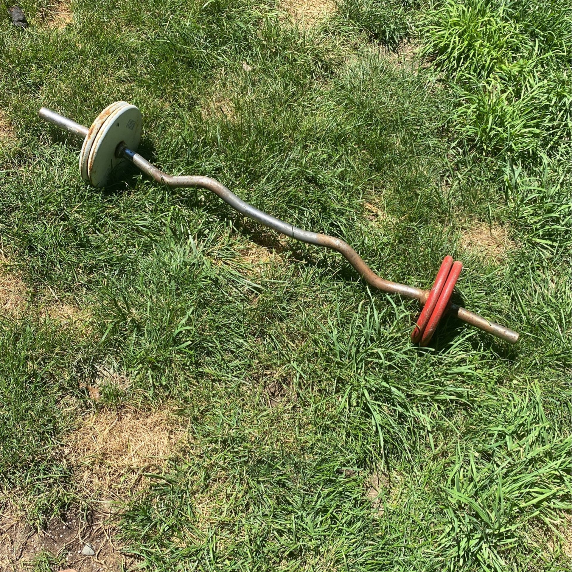 40lbs Plus The Curling Bar They Are Attached And Non Removable