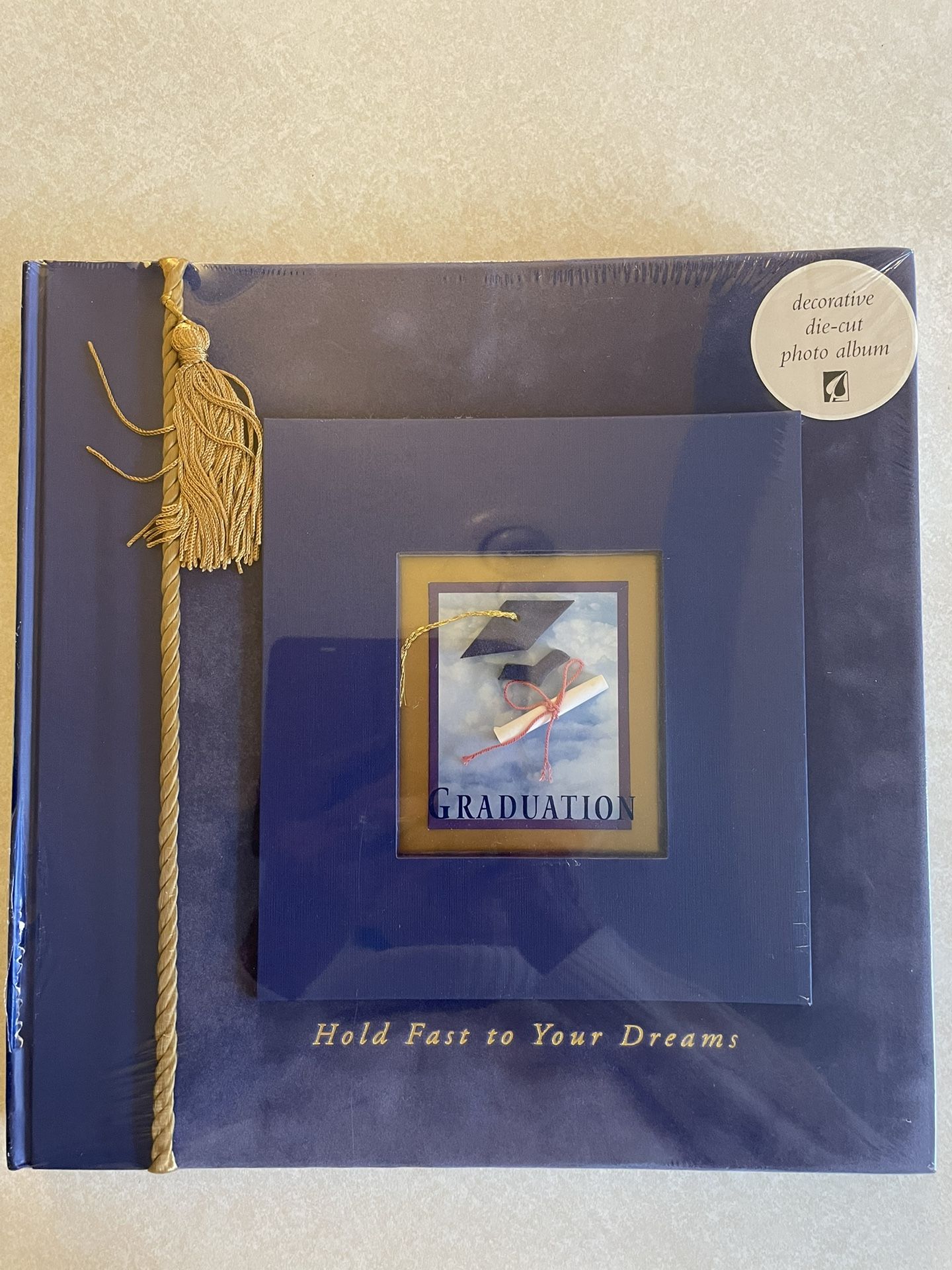 Graduation keepsake scrapbook. Still in original packaging. Pick up in Tigard.