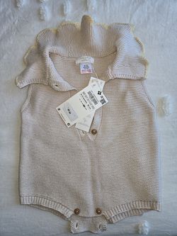 Baby sweater with tag