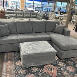 New Grey Sectional And Ottoman 
