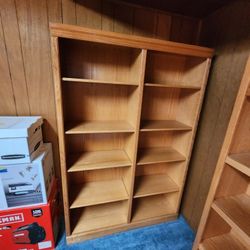 Wood double wide Bookshelf 
Bookcase has 8 adjustable shelves 