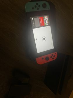 Nintendo Switch With Everything In Picture And Mario Cart 8 Game