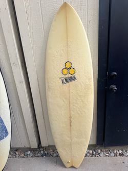Al Merrick surfboard 5’10