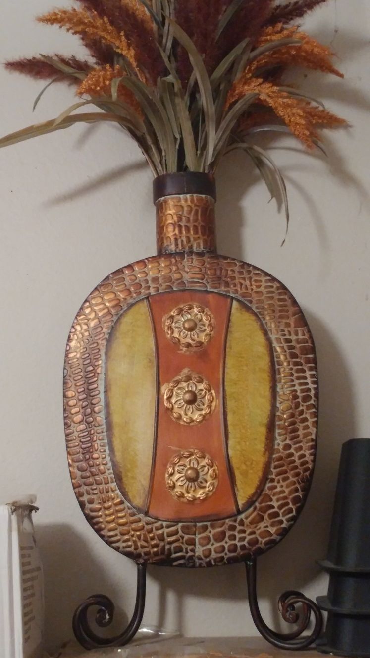 Artificial flower and vase