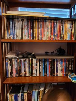 100 DVDs! Pick which ones you want or take them all!