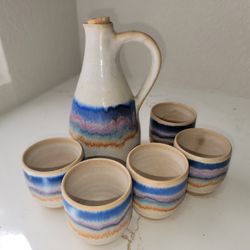 Carafe and five cups