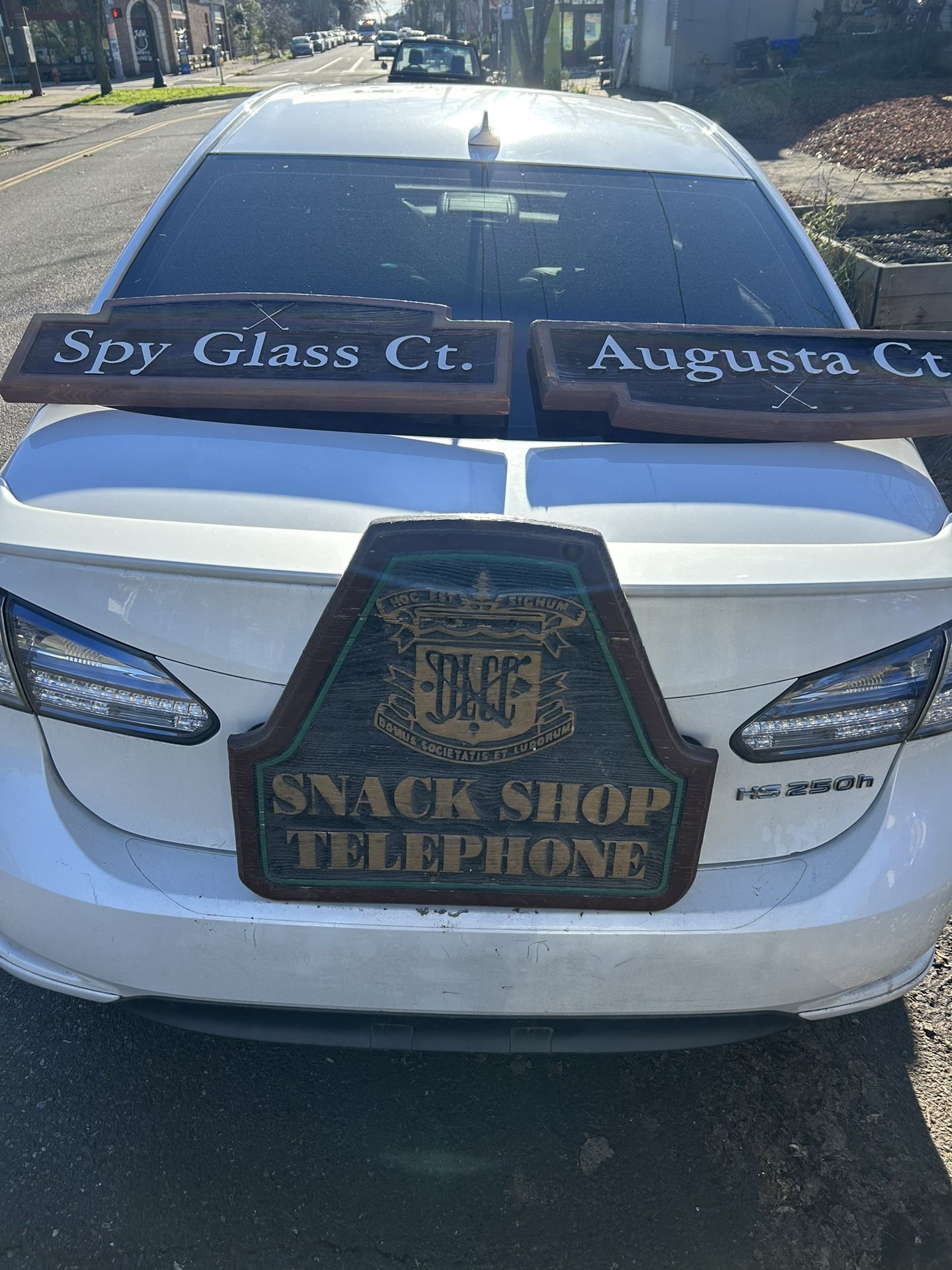 Three handmade wooden golf signs in good condition.   One says spy glass Court,  one says Augusta Court  and the third one says telephone in pro shop.