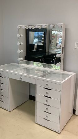 Beautiful all white vanity with mirror