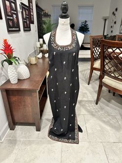 Two NEW dresses size10-12, $38 Each