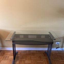 Glass Top Desk with Adjustable Height / See all pictures posted / Good condition / Pickup in Lake Zurich