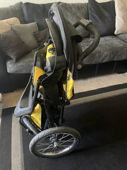 Graco jogging stroller store yellow and black