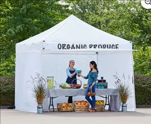 Heavy-duty 10x10 white canopy tent with weights