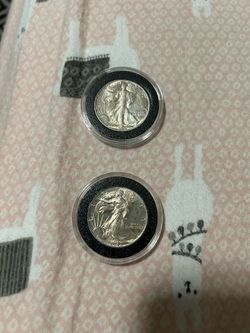 2)) uncirculated walking liberty half dollars