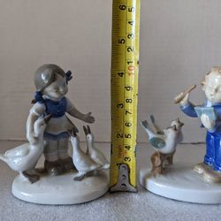Vintage little boy singing with birds porcelain figurine Girl With Geese