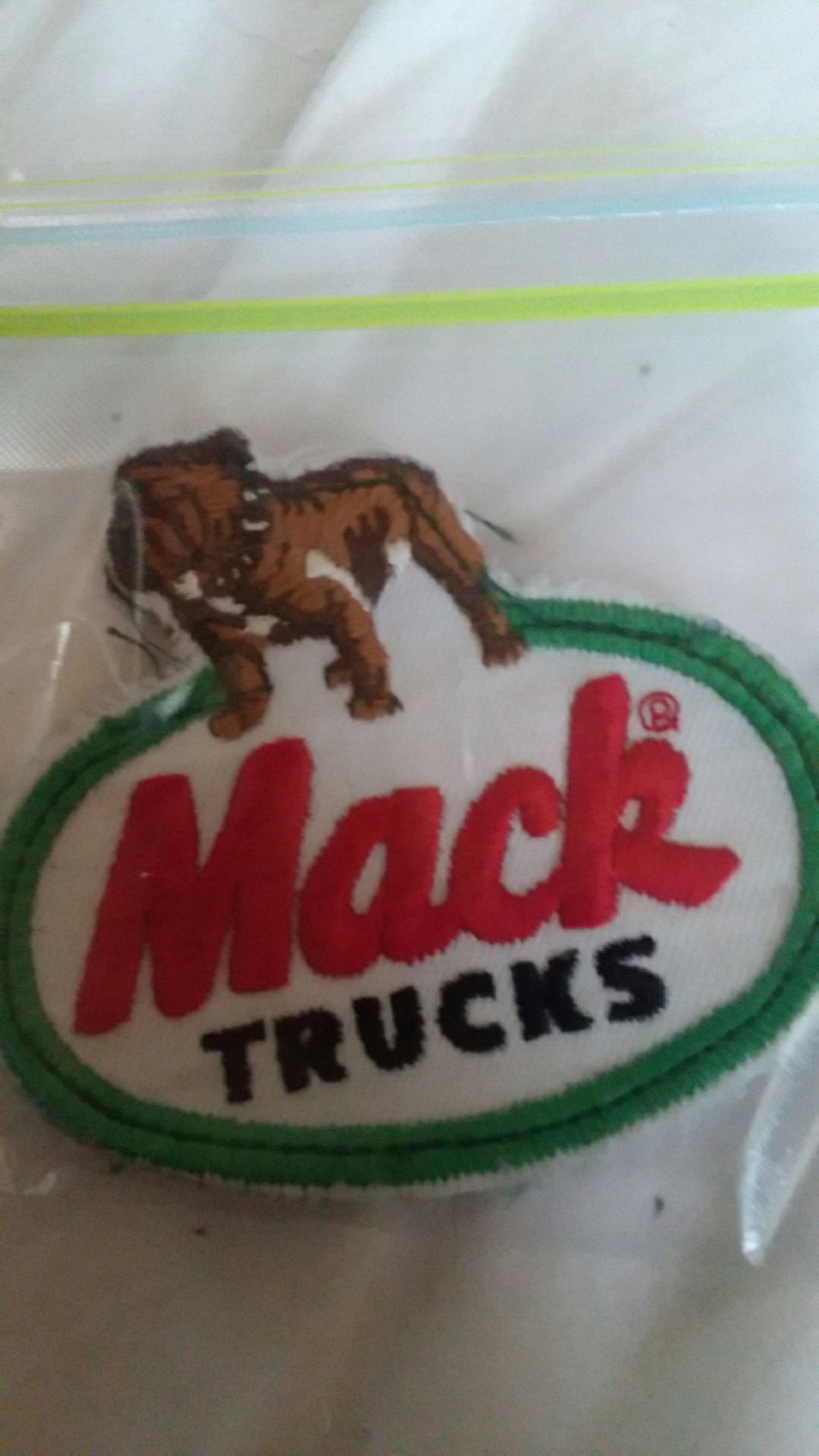 Mack trucks sew on patches