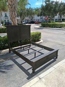 Wooden queen-size bed frame