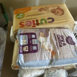 Box Full Of New Born And Size One Diapers 