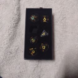 clear and gold liquid core resin dice for dnd and tabletop games