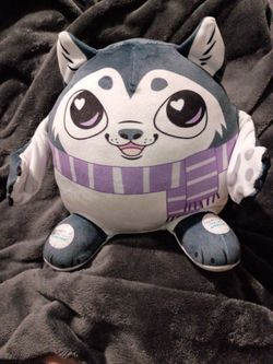 Just Play Flipeez "Kira" The Husky Dog Plush. Had interactions buttons in the Feet that make her arms move or flap.