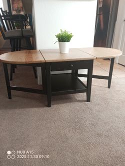 Clean great condition Ikea Arkelstorp drop leaves Black body natural wood top coffee table
