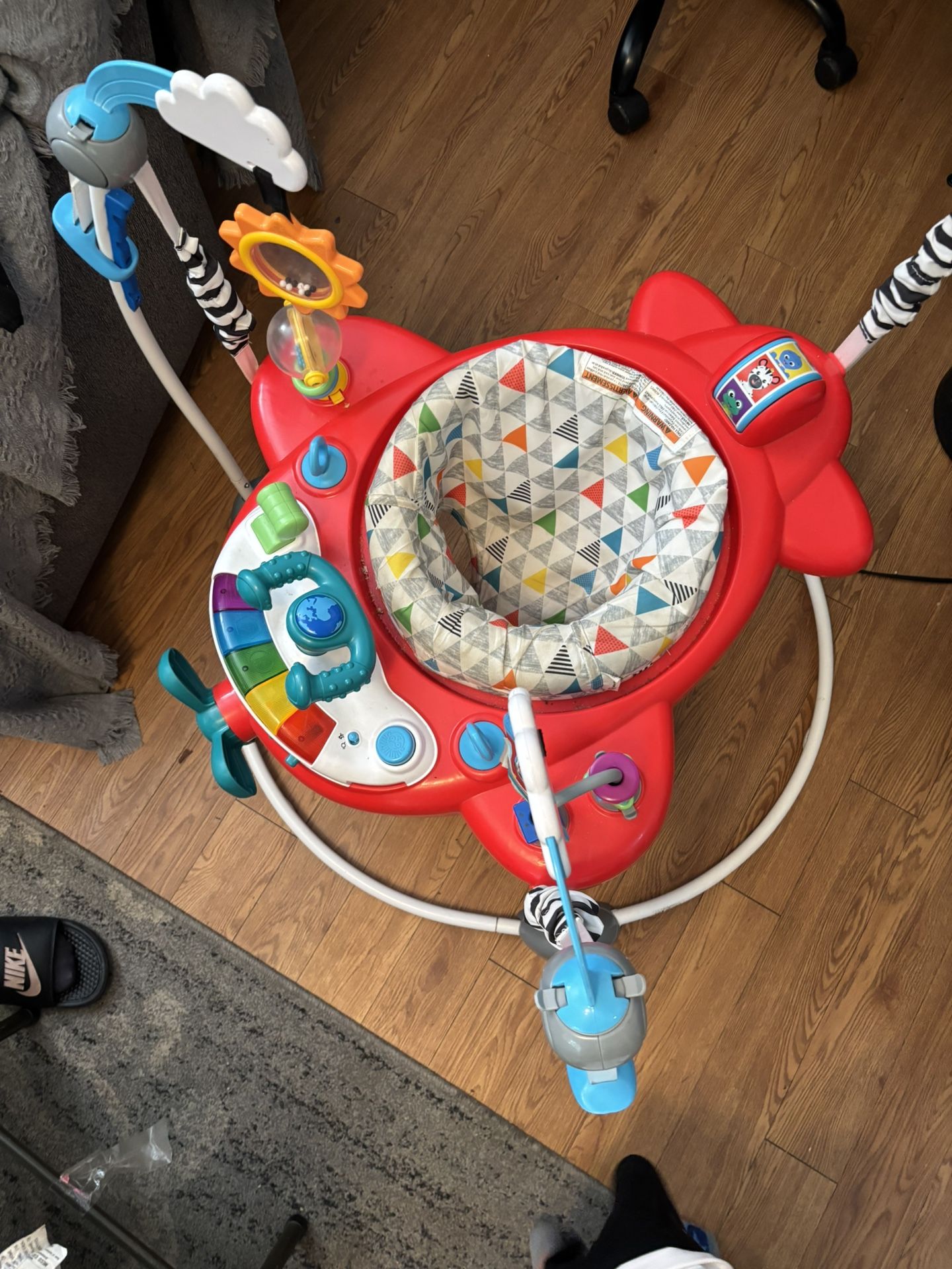 Baby Einstein Ocean Explorers Airplane Adventure 2-in-1 Interactive Activity Jumper with Lights