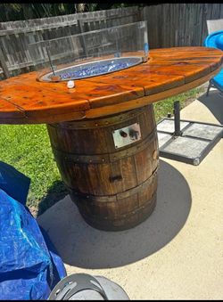 Bourbon barrel fire pit table