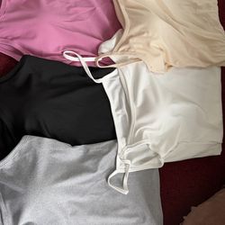 Sleeveless shirt with stripes