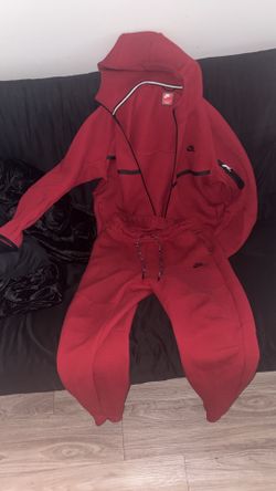 Red Nike tech suit size L