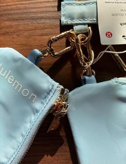 Light blue gold lululemon keychain