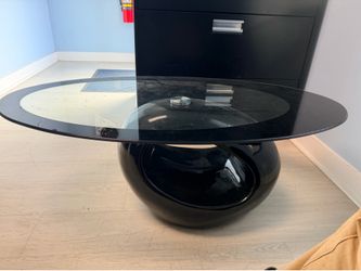 Modern futuristic black oval coffee / end table