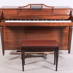 Mahogany Baldwin Howard upright piano w/ bench