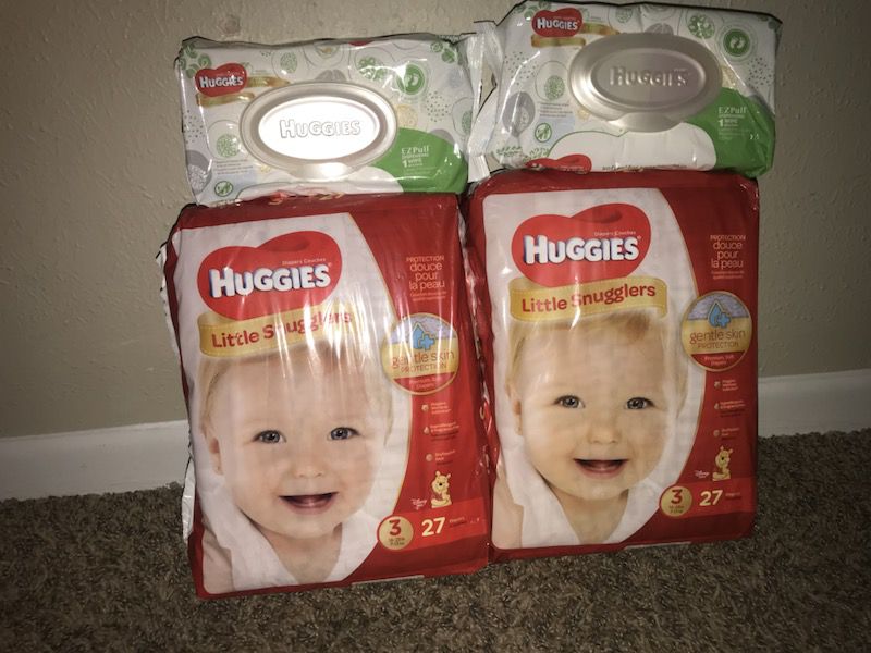 3 huggies Size 3 diapers and 2 packs of wipes