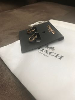 2 sets of coach earrings. Brand new