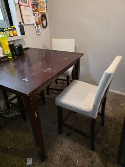 Tall dining table and four chairs MUST SELL TODAY