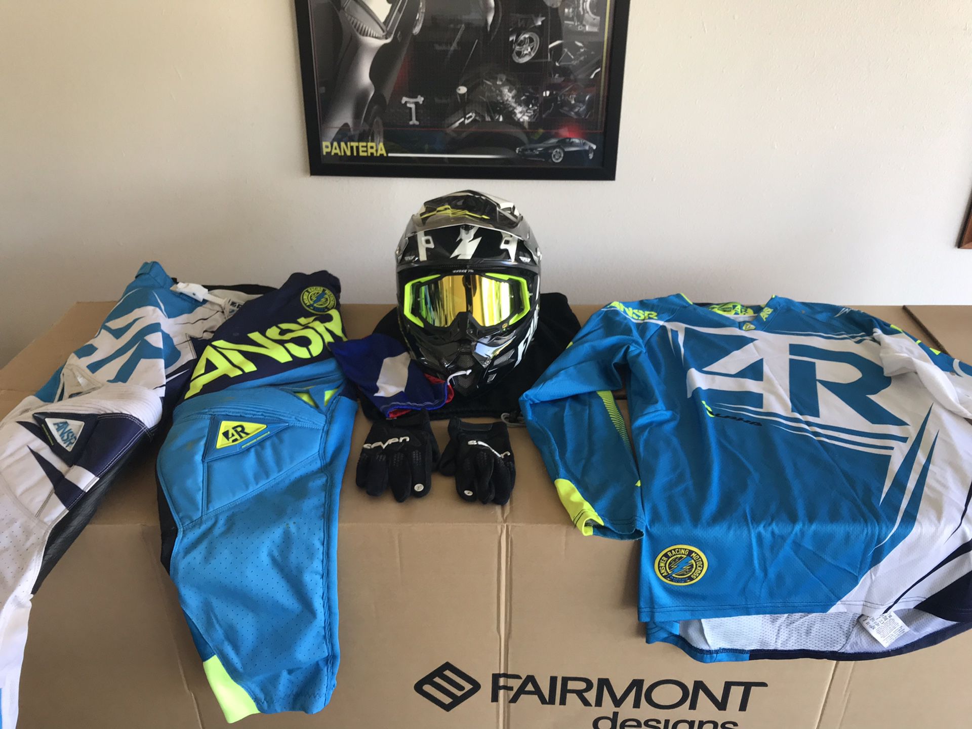 Fly helmet size medium , Answer jersey (XL) and pants (size 34), size large Seven gloves , and 100% goggles for dirt biking.